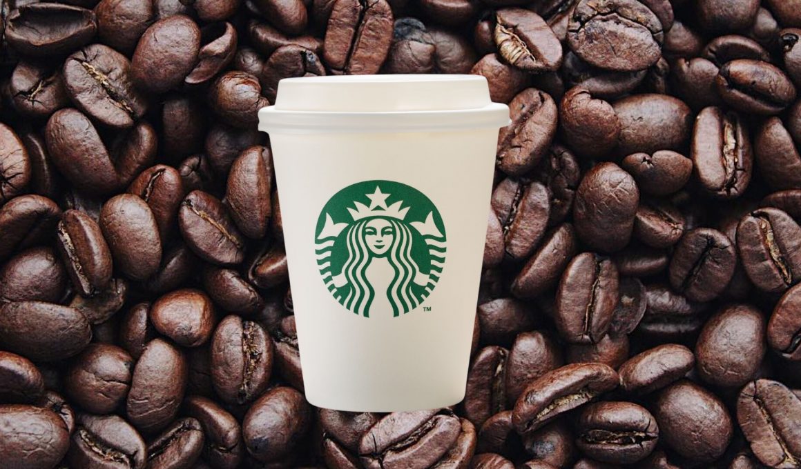 starbucks cups on a background of coffee beans