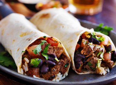 two burritos on a blue plate